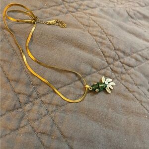 Elegant Gold Koi fish necklace.